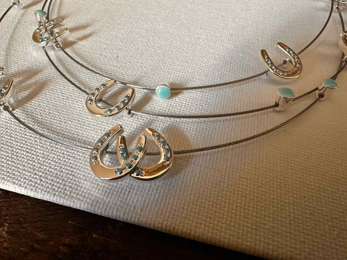 Multi mini horseshoes w/aqua bead necklace