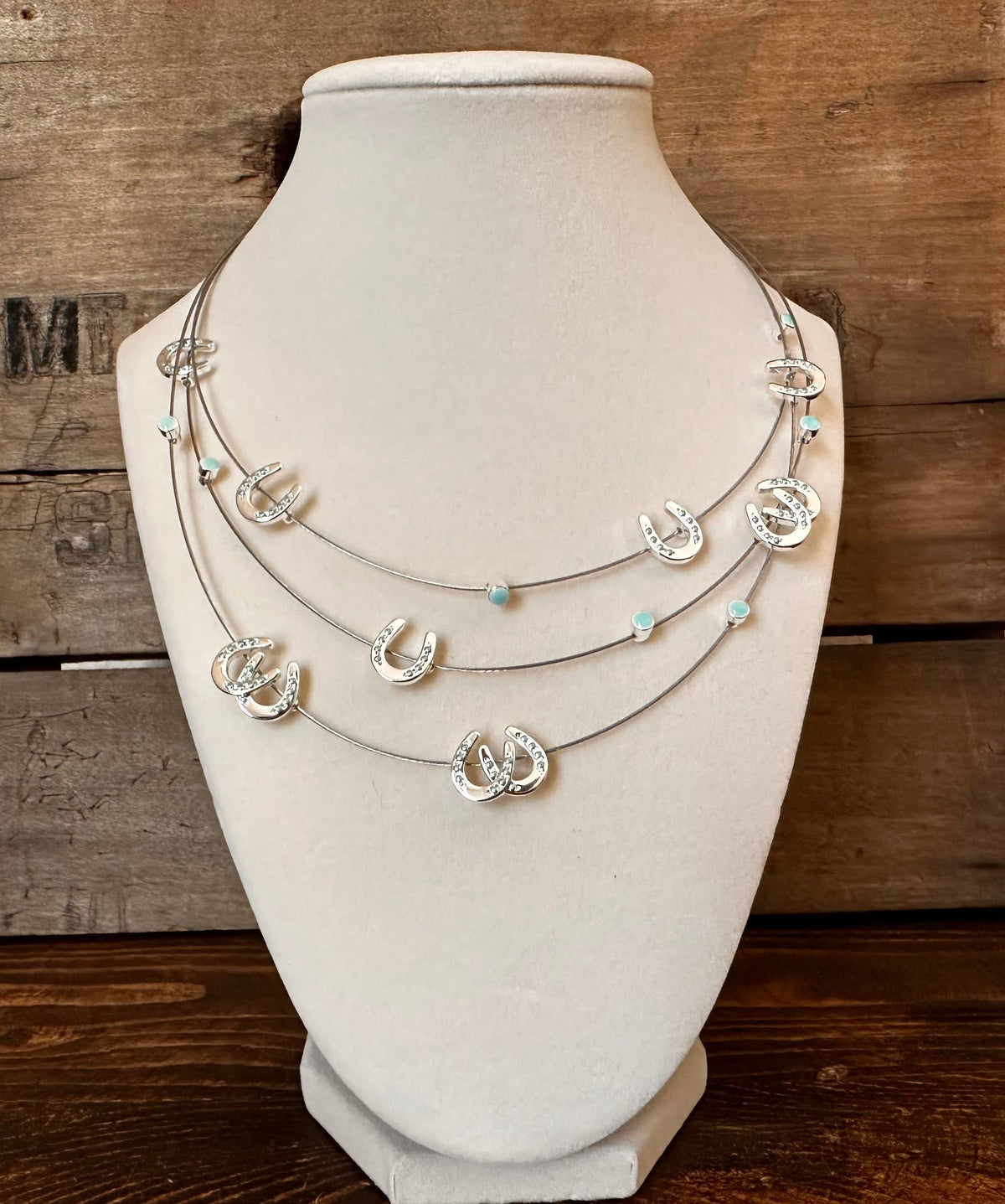 Multi mini horseshoes w/aqua bead necklace